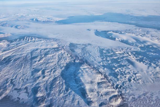 istock Flying over snow covered land 1315676962