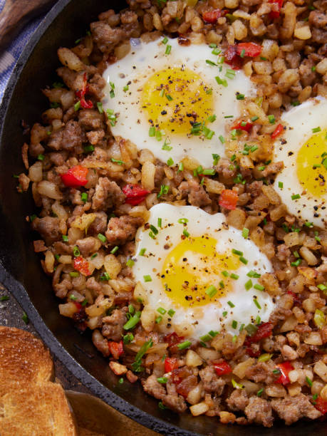 istock Sausage Skillet Scramble with Hash Browns and Fried Eggs 1315689995