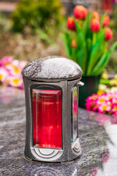 istock Old damaged grave lantern on a gravestone 1315691160