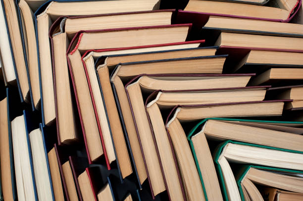 istock Books open in a pile. 1315692618