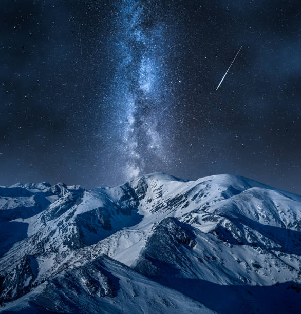 istock Milky way over mountain Kasprowy Wierch in winter. 1315693038