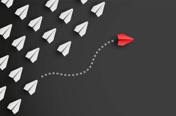 istock Individuality concept. Individual and unique leader red paper plane flies to the side. Vector 1315693449
