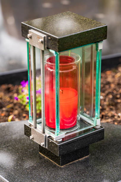 istock Old damaged grave lantern on a gravestone 1315694682