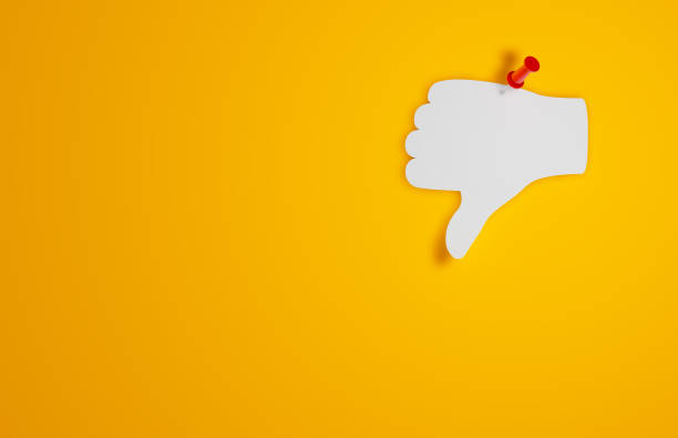 Thumbs Down Symbol on Yellow Background