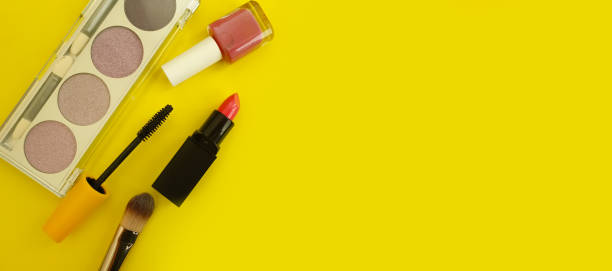 istock decorative cosmetics, mascara, lipstick,  on a colored background 1315701426