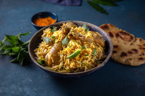 istock Pakistani and Indian chicken Biryani rice with mint and naa bread 1315703885