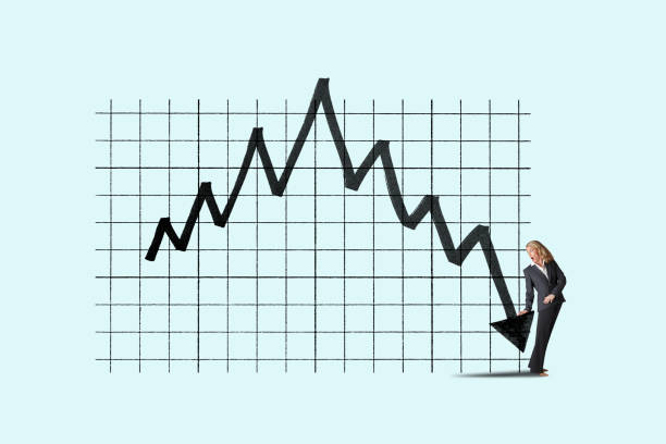 istock Woman Acknowledges Declining Stock Chart 1315707299