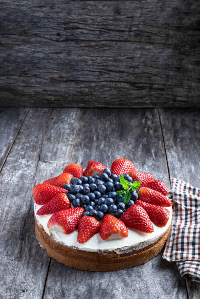 istock Victoria sponge cake on rustic wooden table 1315708649