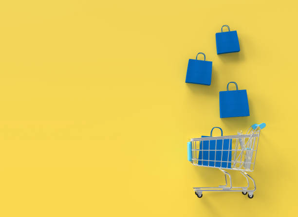 istock Shopping cart filled with blue bags 3D rendering 1315719737