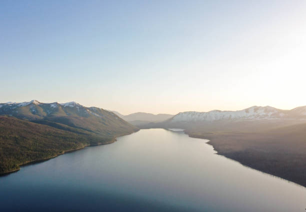 The Lake Zug captured vom high up. The beautiful landscape image shows the Lake zug and some mountain peaks in the background during springtime.