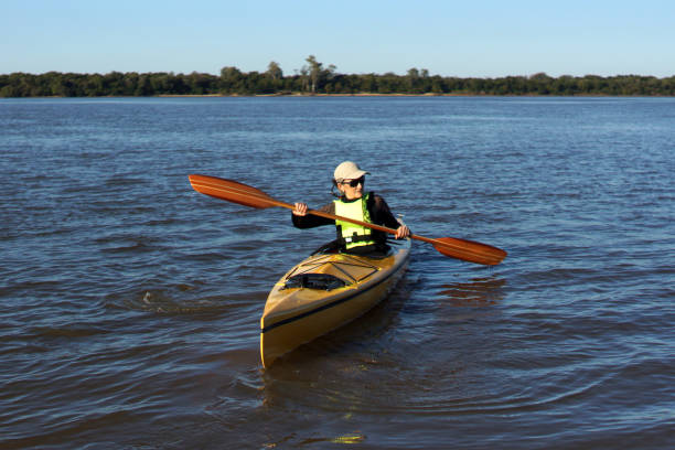 istock woman in her kayak 1315734824