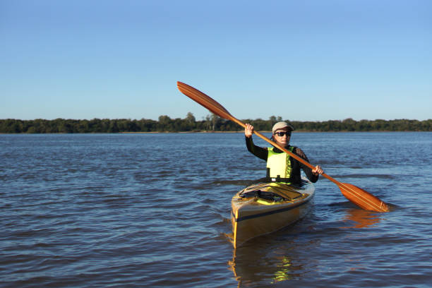 istock woman in her kayak 1315735445