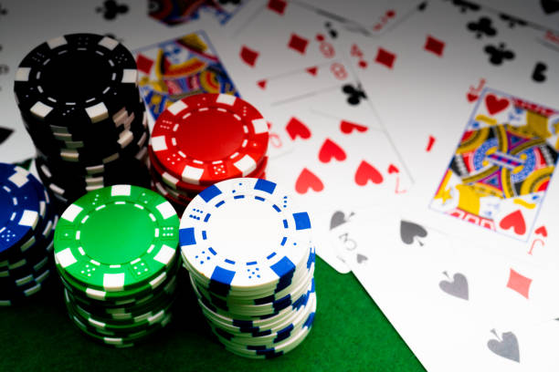 istock Poker chips and playing cards 1315736782