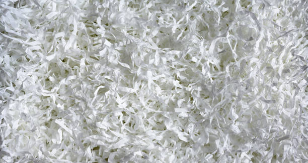 istock Shredded paper texture background, top view of many white paper strips 1315740558