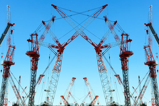 Large construction site with crane abstract background.