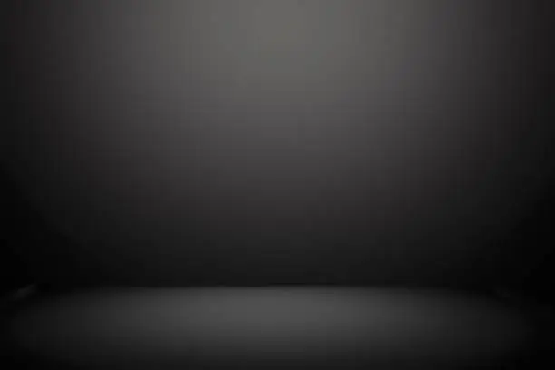 Photo of Abstract black background, empty black gradient room studio background, abstract backgrounds, black background, black room studio background