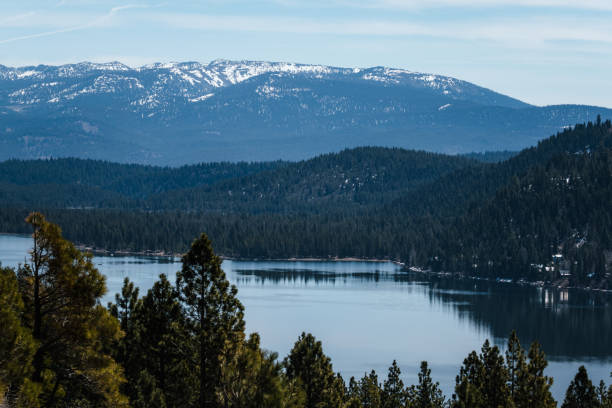 istock Landscape of lake, mountains, and trees 1315777595