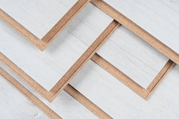 istock A stack of laminate flooring. Laminate flooring panels background texture. Laminate background. Wooden laminate and parquet boards for the floor 1315782136