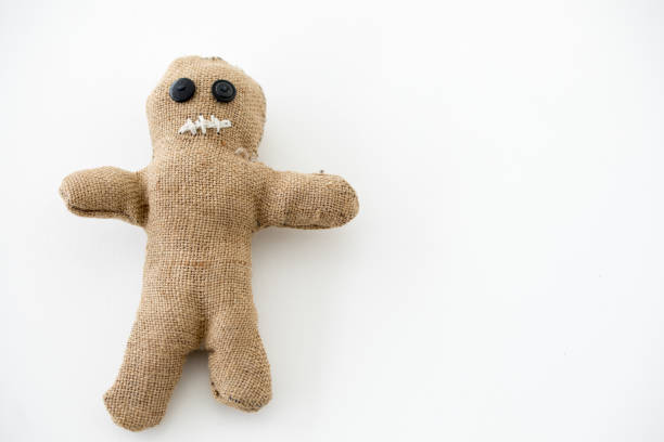 istock Handmade voodoo doll. Craft and hobby concept. Object on a white background. 1315787361