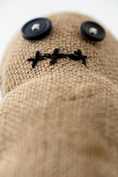 istock Handmade voodoo doll. Craft and hobby concept. Object on a white background. 1315787394