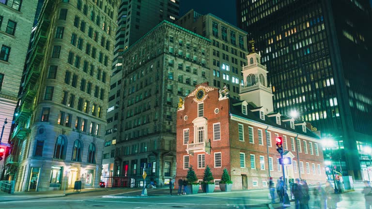 Boston,United States Nov 24 2019: 4K UHD boston Time Lapse footage of Old State House and transportation  of the downtown financial district. crowd Tourist travel visiting   American urban travel city concept