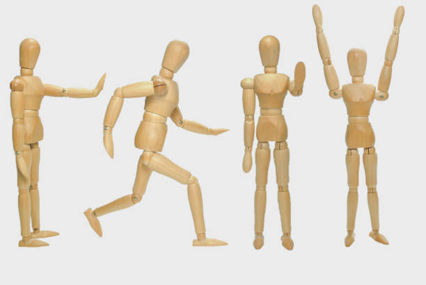 istock Wooden human figure isolated on white background 1315791866
