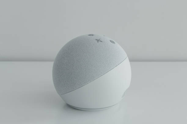istock Voice controlled speaker with activated voice recognition, on light background. 1315799245