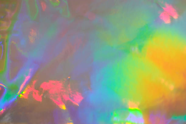 istock abstract holographic iridescent foil texture background with rainbow colored spots 1315803198