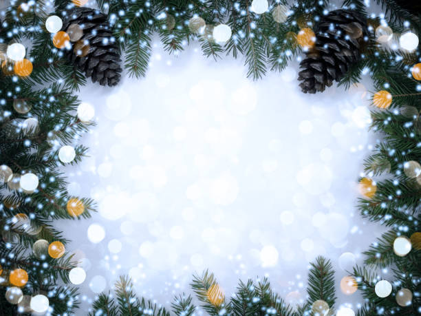 istock christmas background and garland lights with fir branches 1315814835