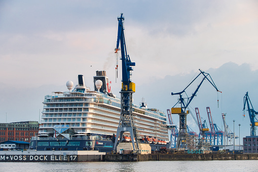 Hamburg, Germany - May 02. 2021: Tui cruise ship in the dock of the port of Hamburg, Germany