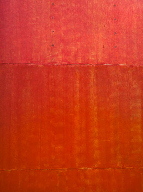 istock old red metal sheet surface with painting brush pattern 1315816032