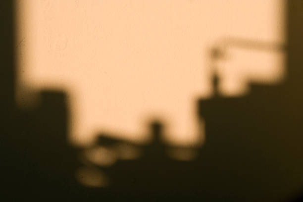 istock An abstract view of the shodow falling on the wall. 1315819170