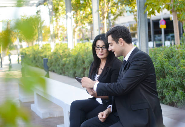 istock Business people talk about project on tablet 1315829620