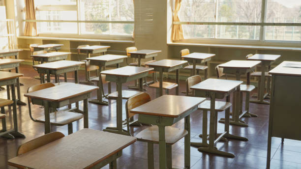 Classroom Desks and chairs in an empty classroom. This is Japanese school. elementary school stock pictures, royalty-free photos & images