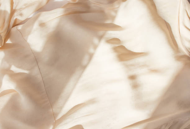 istock Abstract beige background flat layout. Modern minimalistic background with crumpled fabric texture and cotton folds. Top view for presentation 1315833958
