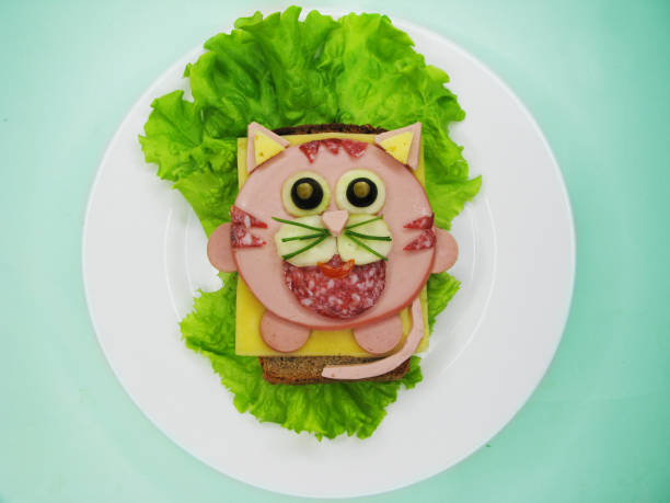 istock creative sandwich snack with sausage and cheese for child cat form 1315835514