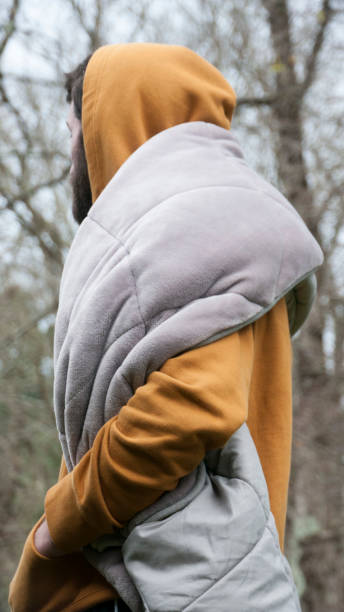 istock Man covered with blanket in a forest 1315837958