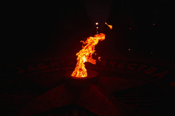 istock Protecting the fromth9. Fire, eternal fire, symbol of victory. A developing fire. Flames. Yellow orange 1315839355
