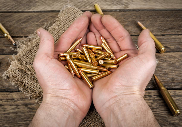 ammunition of various calibers in the human palms