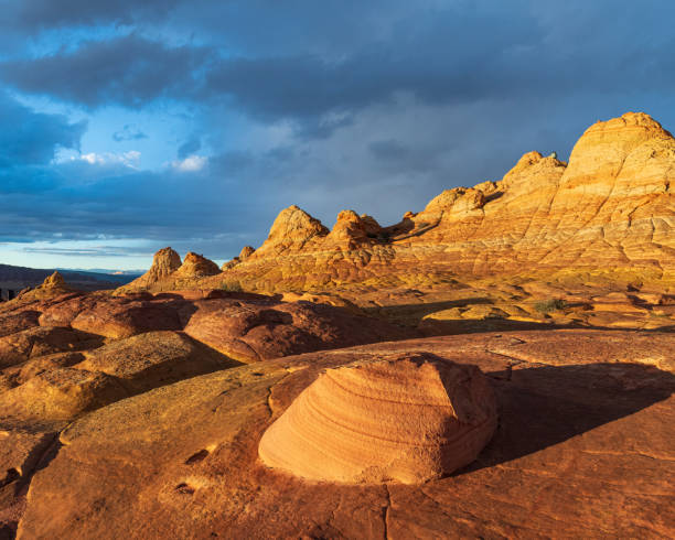 Rock Formations at Coyote Buttes South in Arizona at Sunset Colorful rock formations at Coyote Buttes South in Arizona escalante stock pictures, royalty-free photos & images