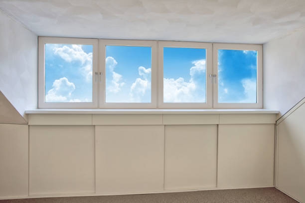 Fresh white modern dormer window with blue sky and white clouds view, New dormer, roof window in empty new house Fresh white modern dormer window with blue sky and white clouds view, New dormer, roof window in empty new house closeup dormer stock pictures, royalty-free photos & images