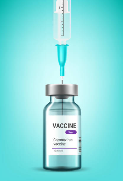 istock Vaccine glass vial with needle of plastic syringe inside 1315860641