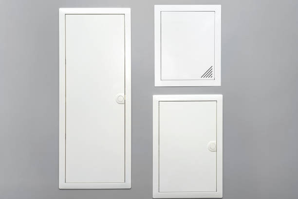 istock Two closed electrical boxes with fuses and one multimedia box, placed in the garage in the gray wall. 1315869347