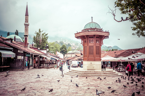 Sebilj Brunnen (Fountain) at the Pigeon Square is a famous place at Bascarsija District in Sarajevo where people often meet, get a burek, cevap or spot a tourist.