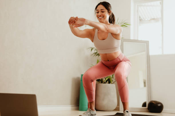 istock Woman doing stretching workout at home 1315871981