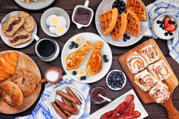 istock Fathers Day brunch table scene. Above view on a dark wood background. 1315875894