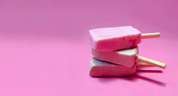 istock handmade ice lollies on pink background 1315876712