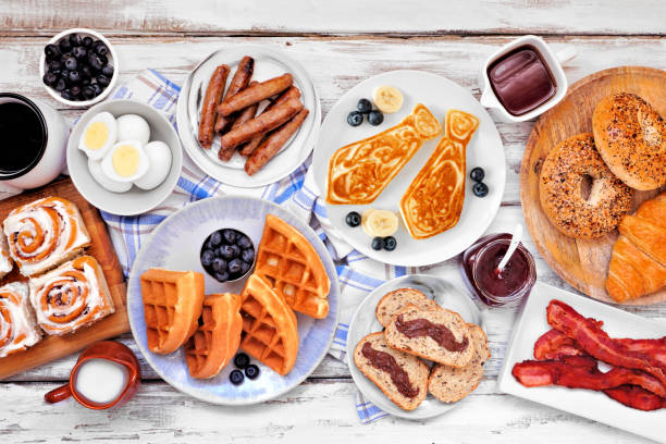 istock Fathers Day breakfast table scene. Overhead view on a white wood background. 1315876741