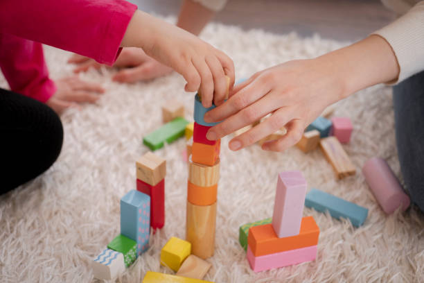 istock Mother and Daughter playing together 1315889053