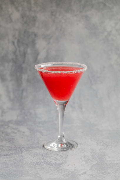 istock A red drink in a martini glass with a sugar or salt coated  edge 1315890974